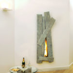 Foyer bois design avec bronze FOCUS - Atraconfort